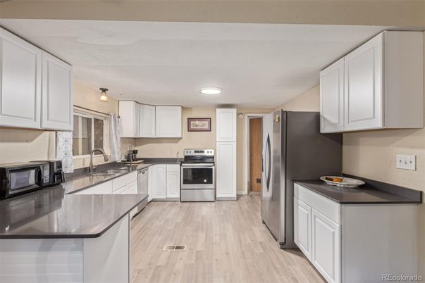 Interior, Kitchen, Recessed Lighting, Stainless Steel Appliances, Wood Texture Flooring