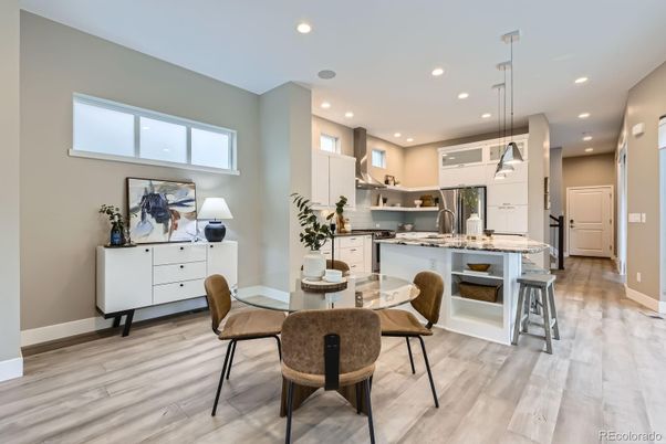 Dining room, Interior, Kitchen, Pendant Lights, Recessed Lighting, Stainless Steel Appliances, Wood Texture Flooring