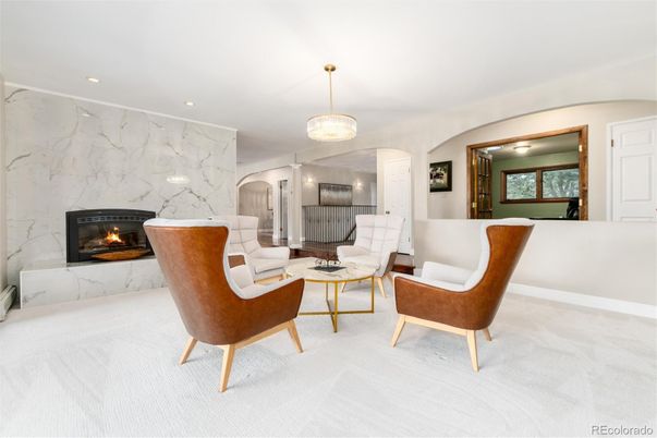 Fireplace, Interior, Living room, Marble Walls, Pendant Lights, Recessed Lighting