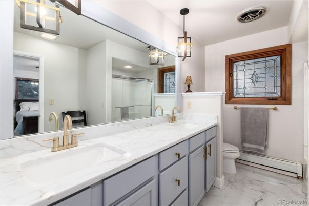 Bathroom, Dual Sink Vanities, Glass Shower, Interior, Marble, Pendant Lights, Recessed Lighting