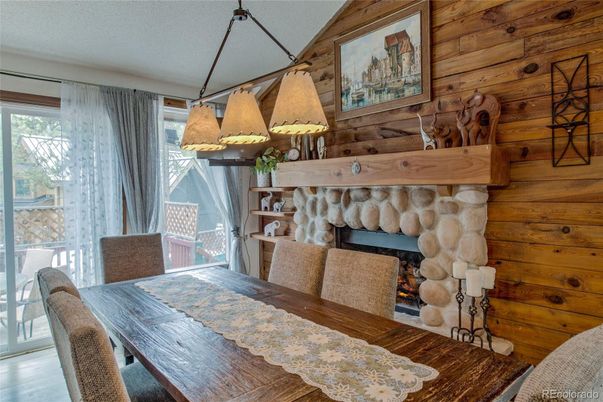 Dining room, Fireplace, Interior, Pendant Lights, Wood Texture Flooring, Wooden Walls
