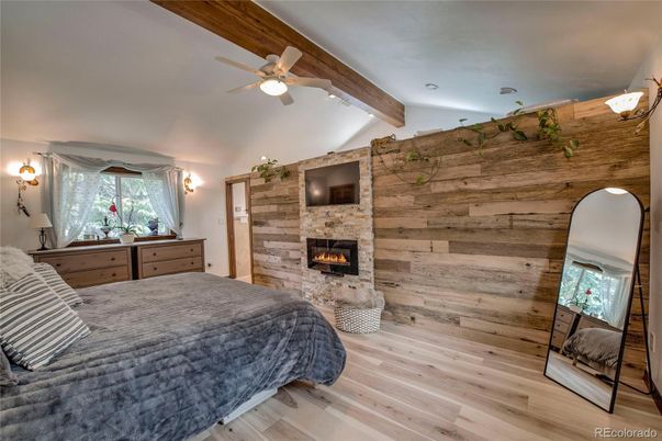 Bedroom, Fireplace, Interior, Recessed Lighting, Stone Walls, Wooden Beams, Wood Texture Flooring, Wooden Walls