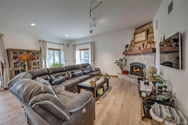 Fireplace, Interior, Living room, Recessed Lighting, Wood Texture Flooring