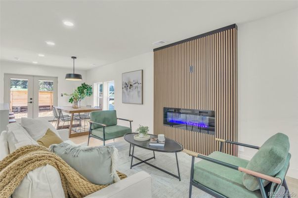 Dining room, Fireplace, Interior, Living room, Pendant Lights, Recessed Lighting, Wood Texture Flooring