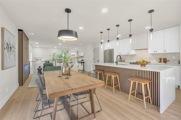 Dining room, Interior, Kitchen, Pendant Lights, Recessed Lighting, Stainless Steel Appliances, Wood Texture Flooring