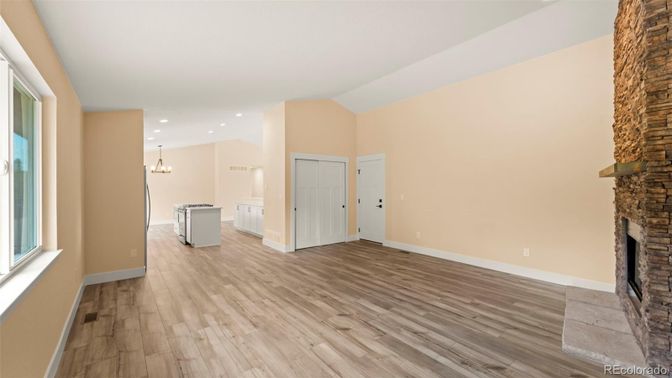 Empty room, Fireplace, Interior, Pendant Lights, Recessed Lighting, Wood Texture Flooring