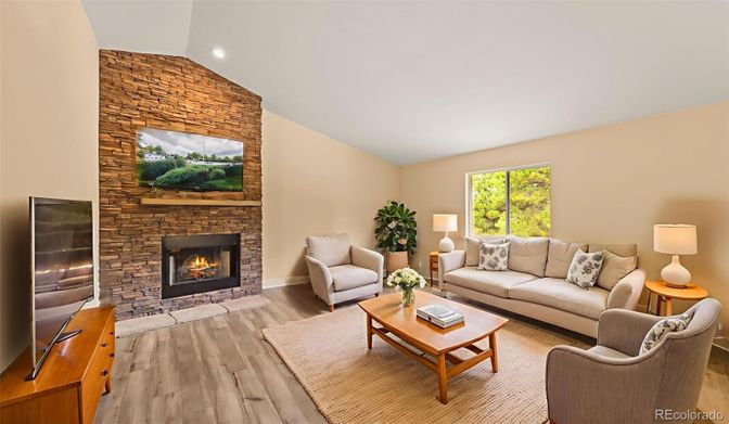 Fireplace, Interior, Living room, Recessed Lighting, Stone Walls, Wood Texture Flooring