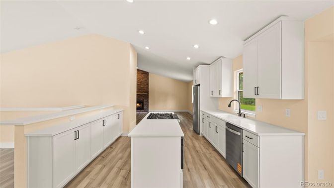 Fireplace, Interior, Kitchen, Recessed Lighting, Wood Texture Flooring