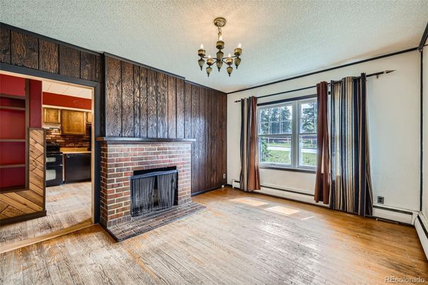Empty room, Fireplace, Interior, Pendant Lights, Wood Texture Flooring