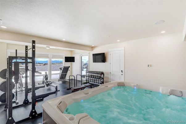 Fitness Equipment, Gym, Hot Tub, Interior, Recessed Lighting, Water