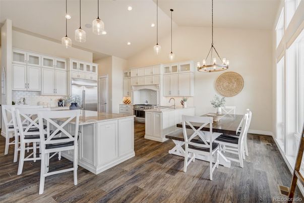 Dining room, Interior, Kitchen, Pendant Lights, Recessed Lighting, Stainless Steel Appliances, Wood Texture Flooring