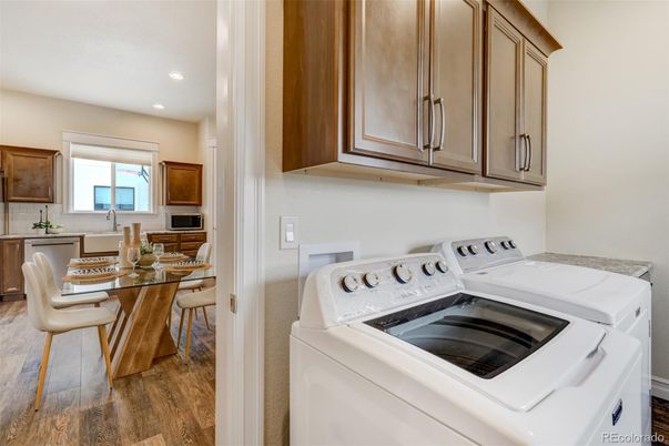 Dining room, Interior, Kitchen, Recessed Lighting, Washer, Wood Texture Flooring