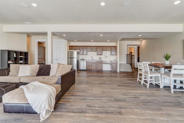 Dining room, Interior, Kitchen, Living room, Recessed Lighting, Stainless Steel Appliances, Wood Texture Flooring