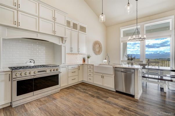 Dining room, Interior, Kitchen, Pendant Lights, Stainless Steel Appliances, Water, Wood Texture Flooring