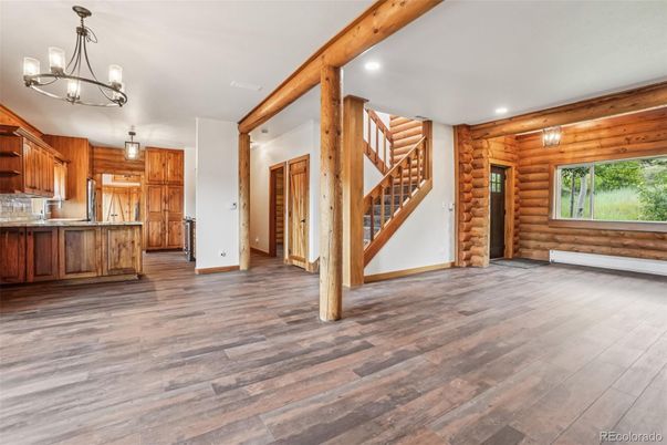 Chandelier, Empty room, Interior, Kitchen, Pendant Lights, Recessed Lighting, Wooden Beams, Wood Texture Flooring, Wooden Walls