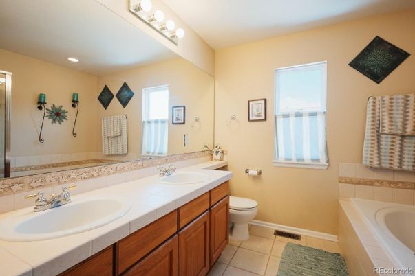 Bathroom, Dual Sink Vanities, Interior, Recessed Lighting, Tile Countertops