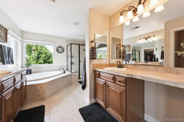 Bathroom, Dual Sink Vanities, Glass Shower, Interior, Recessed Lighting, Tile Countertops