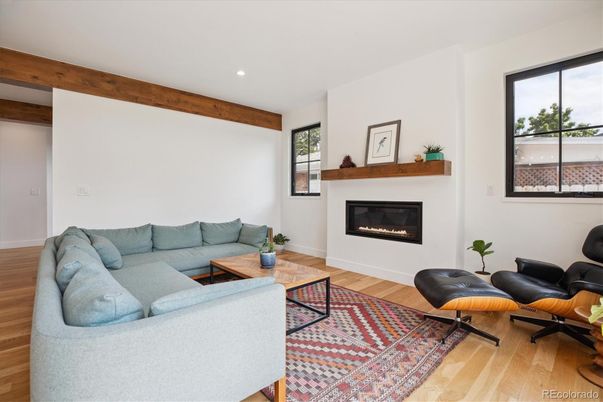 Fireplace, Interior, Living room, Recessed Lighting, Wooden Beams, Wood Texture Flooring