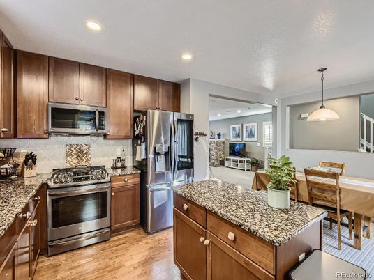 Dining room, Interior, Kitchen, Pendant Lights, Recessed Lighting, Stainless Steel Appliances, Wood Texture Flooring