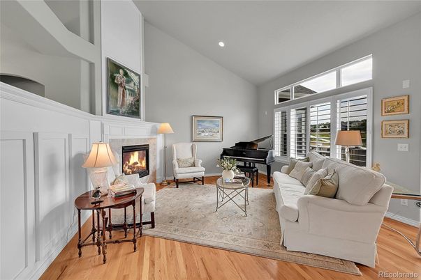 Fireplace, Interior, Living room, Piano, Recessed Lighting, Wood Texture Flooring