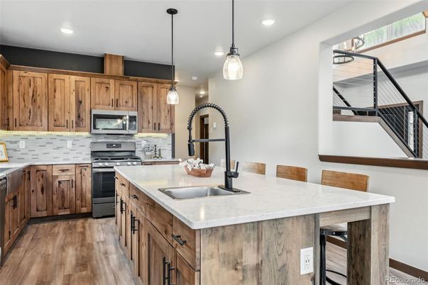 Interior, Kitchen, Pendant Lights, Recessed Lighting, Stainless Steel Appliances, Wood Texture Flooring