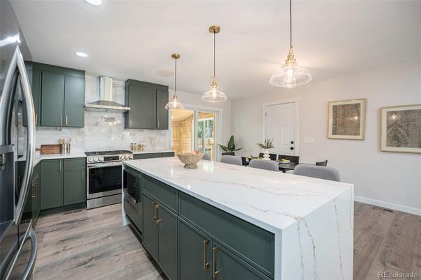 Dining room, Interior, Kitchen, Pendant Lights, Recessed Lighting, Stainless Steel Appliances, Wood Texture Flooring