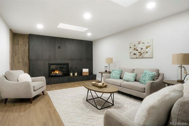 Fireplace, Interior, Living room, Recessed Lighting, Wood Texture Flooring