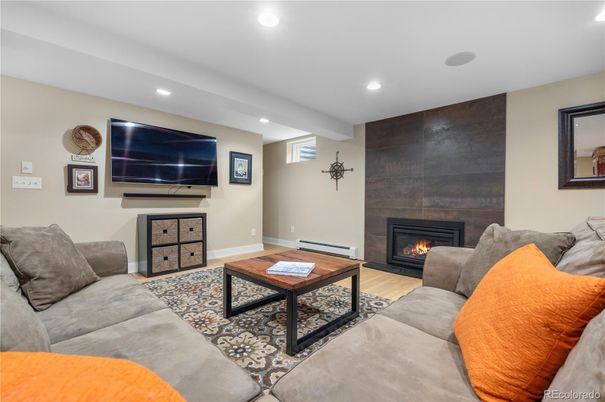 Fireplace, Interior, Living room, Recessed Lighting, Wood Texture Flooring