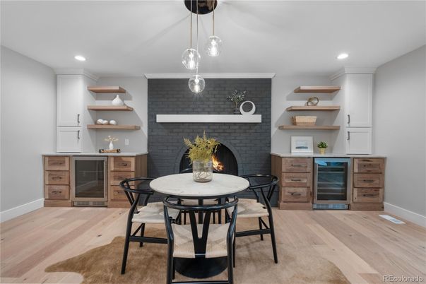 Dining room, Fireplace, Interior, Pendant Lights, Recessed Lighting, Wood Texture Flooring