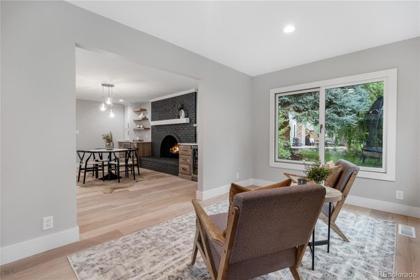 Dining room, Fireplace, Interior, Pendant Lights, Recessed Lighting, Stone Walls, Wood Texture Flooring