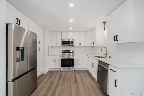 Interior, Kitchen, Pendant Lights, Recessed Lighting, Stainless Steel Appliances, Wood Texture Flooring