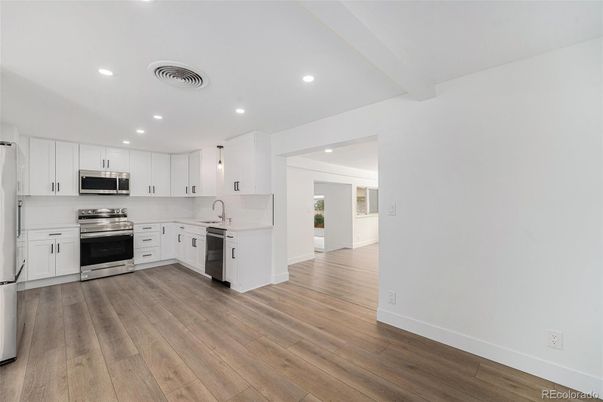 Interior, Kitchen, Pendant Lights, Recessed Lighting, Stainless Steel Appliances, Wood Texture Flooring