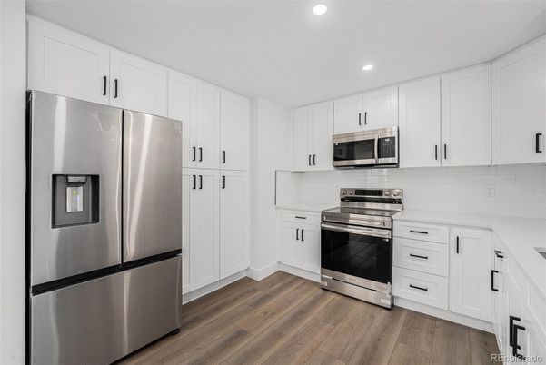 Interior, Kitchen, Recessed Lighting, Stainless Steel Appliances, Wood Texture Flooring
