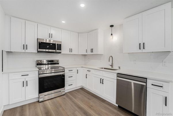 Interior, Kitchen, Pendant Lights, Recessed Lighting, Stainless Steel Appliances, Wood Texture Flooring