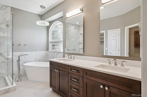 Bathroom, Dual Sink Vanities, Free Standing Baths, Glass Shower, Interior, Marble, Marble Walls, Recessed Lighting