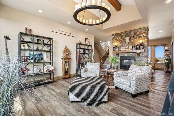 Fireplace, Interior, Living room, Pendant Lights, Recessed Lighting, Stone Walls, Wooden Beams, Wood Texture Flooring