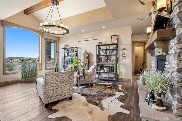 Chandelier, Fireplace, Interior, Recessed Lighting, Wooden Beams, Wood Texture Flooring