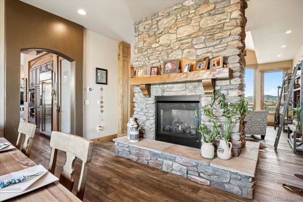 Fireplace, Interior, Recessed Lighting, Stone Walls, Wood Texture Flooring