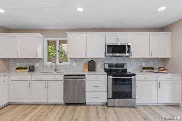 Interior, Kitchen, Recessed Lighting, Stainless Steel Appliances, Wood Texture Flooring