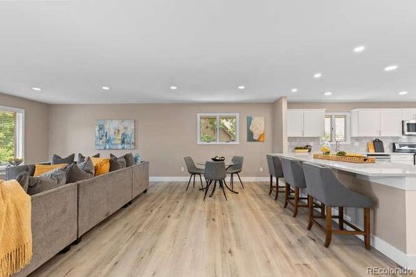 Dining room, Interior, Kitchen, Living room, Recessed Lighting, Stainless Steel Appliances, Wood Texture Flooring