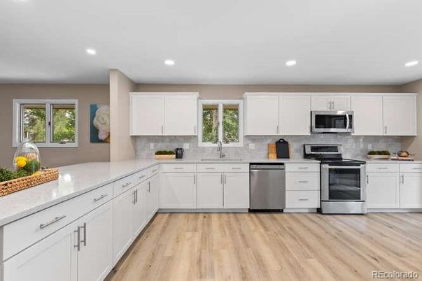 Interior, Kitchen, Recessed Lighting, Stainless Steel Appliances, Wood Texture Flooring