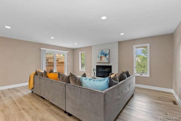 Fireplace, Interior, Living room, Recessed Lighting, Wood Texture Flooring