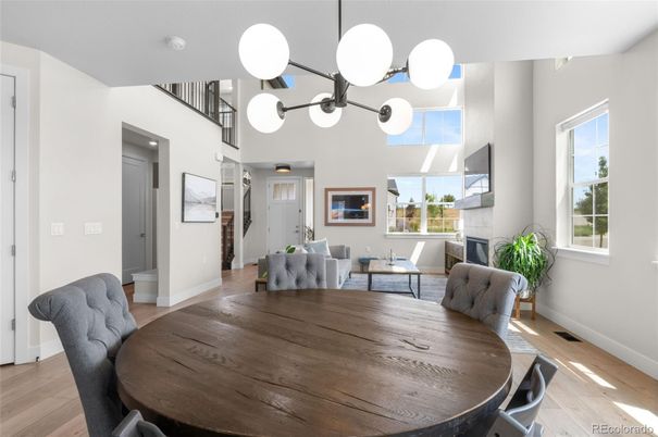 Dining room, Fireplace, Interior, Pendant Lights, Wood Texture Flooring