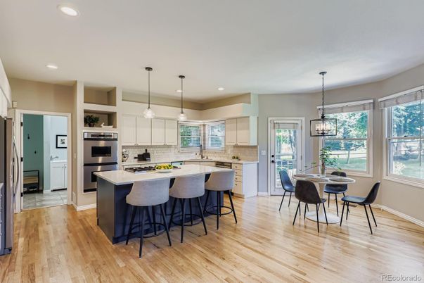 Dining room, Interior, Kitchen, Pendant Lights, Recessed Lighting, Stainless Steel Appliances, Wood Texture Flooring