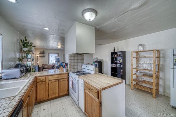 Interior, Kitchen, Recessed Lighting, Tile Countertops