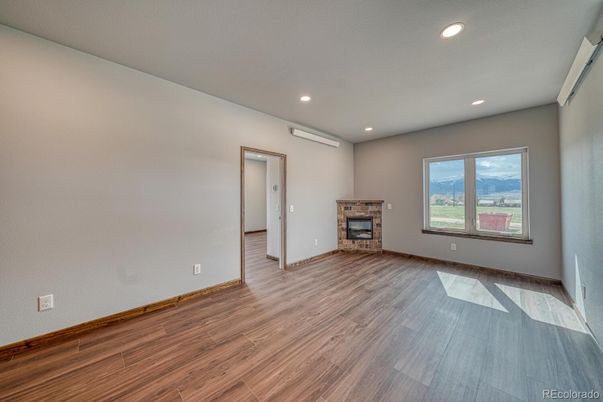 Empty room, Fireplace, Interior, Recessed Lighting, Wood Texture Flooring