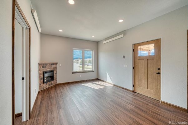 Empty room, Fireplace, Interior, Recessed Lighting, Wood Texture Flooring