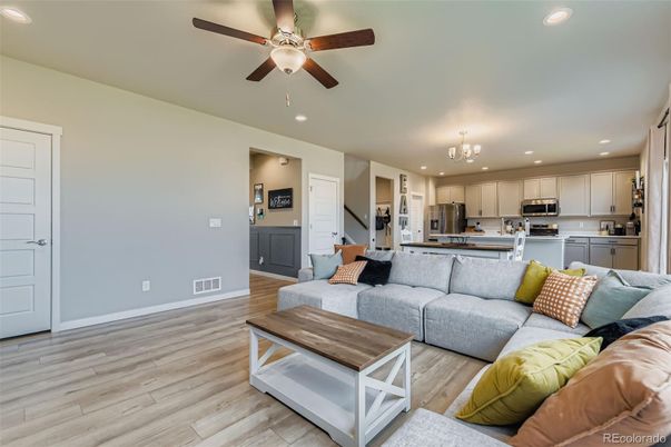 Chandelier, Interior, Kitchen, Living room, Recessed Lighting, Stainless Steel Appliances, Wood Texture Flooring