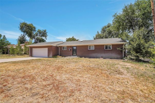 Attached, Backyard, Exterior, Facade, Brick Facade, Ranch