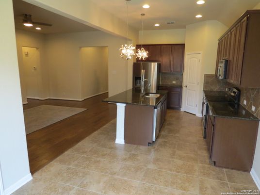 Chandelier, Interior, Kitchen, Pendant Lights, Recessed Lighting, Stainless Steel Appliances, Wood Texture Flooring